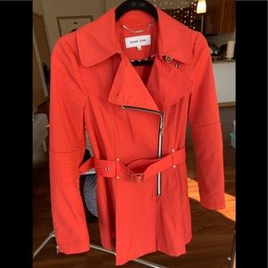 Trendy bright orange fitted jacket